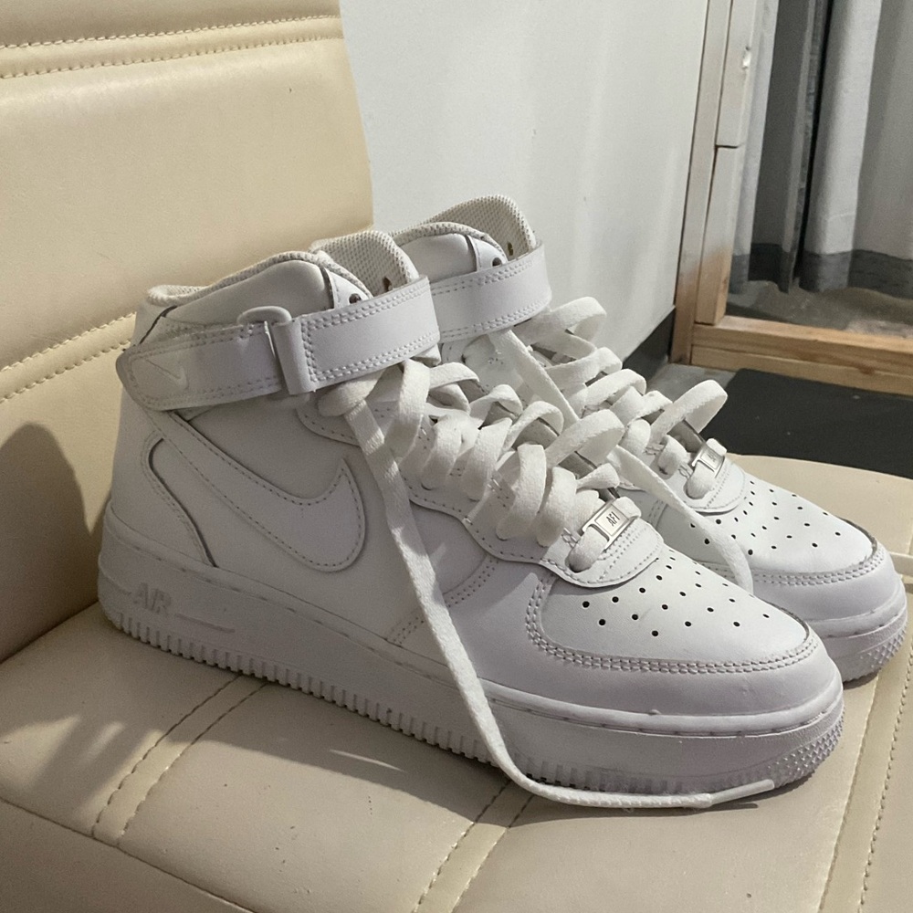 Nike white Air Force mid with ankle strap.